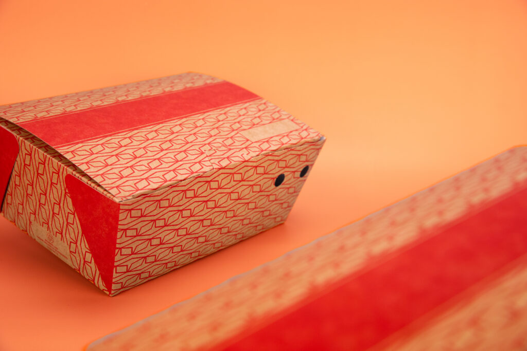 Clamshell custom print with red geometric design